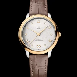 34 mm, acciaio‑oro giallo su cinturino di pelle