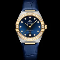 36 mm, acciaio‑oro giallo su cinturino di pelle