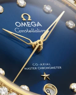 36 mm, acciaio‑oro giallo su cinturino di pelle