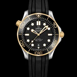 42 mm, acciaio‑oro giallo su cinturino in caucciù
