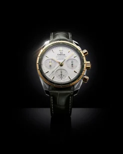 38 mm, acciaio‑oro giallo su cinturino di pelle