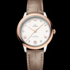 34 mm, acciaio‑oro Sedna™ su cinturino di pelle
