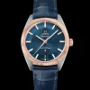 39 mm, acciaio‑oro Sedna™ su cinturino di pelle
