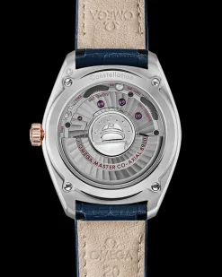 39 mm, acciaio‑oro Sedna™ su cinturino di pelle