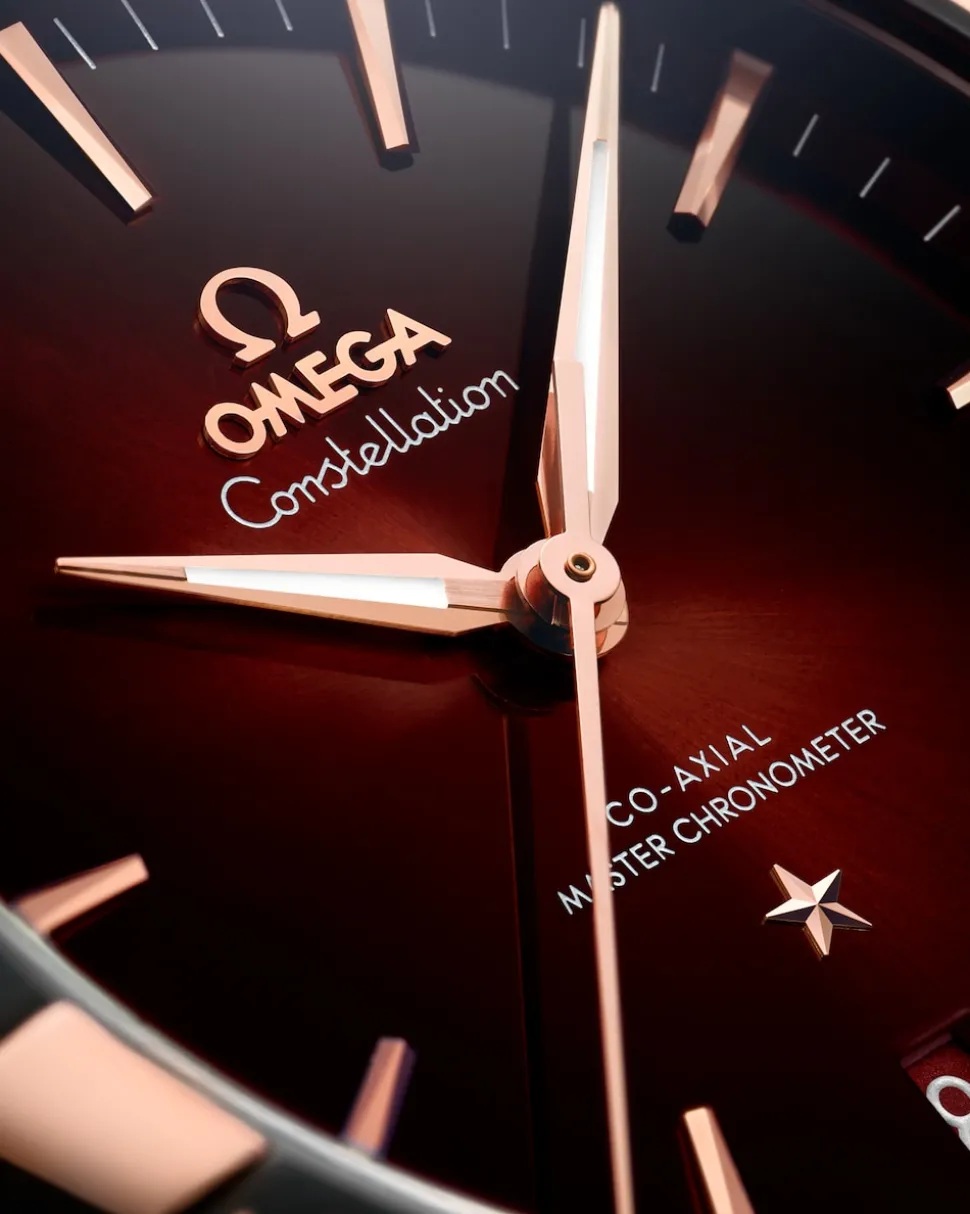 41 mm, acciaio‑oro Sedna™ su cinturino di pelle