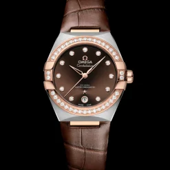 36 mm, acciaio‑oro Sedna™ su cinturino di pelle