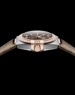 36 mm, acciaio‑oro Sedna™ su cinturino di pelle