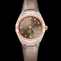 34 mm, acciaio‑oro Sedna™ su cinturino di pelle