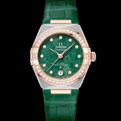 29 mm, acciaio‑oro Sedna™ su cinturino di pelle