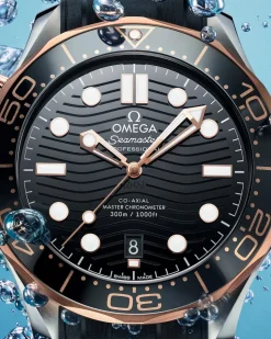 42 mm, acciaio‑oro Sedna™ su cinturino in caucciù