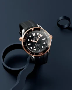 42 mm, acciaio‑oro Sedna™ su cinturino in caucciù