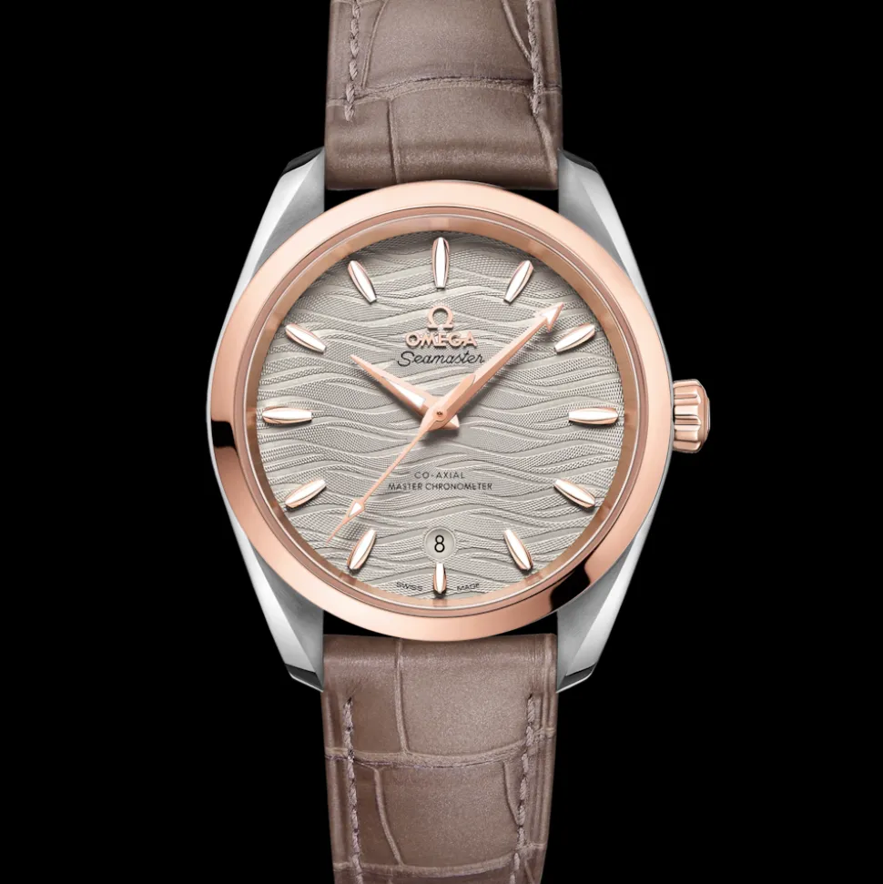 38 mm, acciaio‑oro Sedna™ su cinturino di pelle