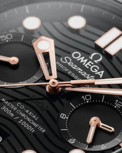 44 mm, acciaio‑oro Sedna™ su cinturino in caucciù