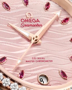 34 mm, acciaio‑oro Sedna™ su cinturino di pelle