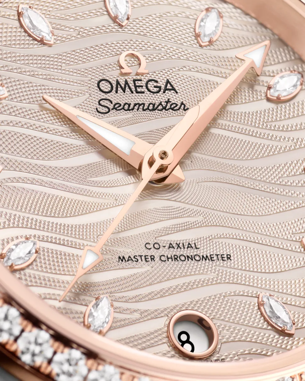 34 mm, acciaio‑oro Sedna™ su cinturino di pelle
