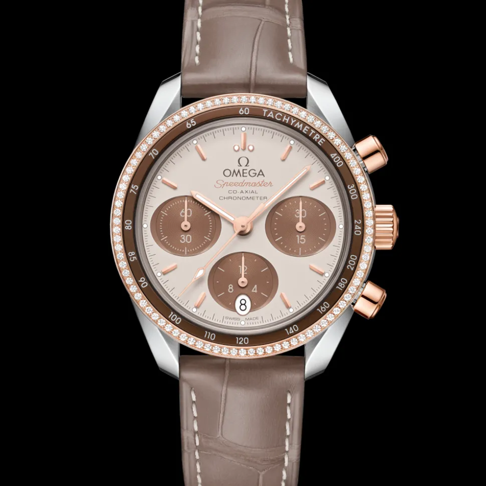 38 mm, acciaio‑oro Sedna™ su cinturino di pelle
