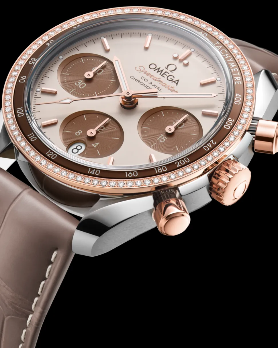 38 mm, acciaio‑oro Sedna™ su cinturino di pelle