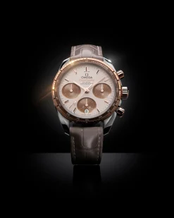 38 mm, acciaio‑oro Sedna™ su cinturino di pelle