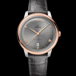 40 mm, acciaio‑oro Sedna™ su cinturino di pelle