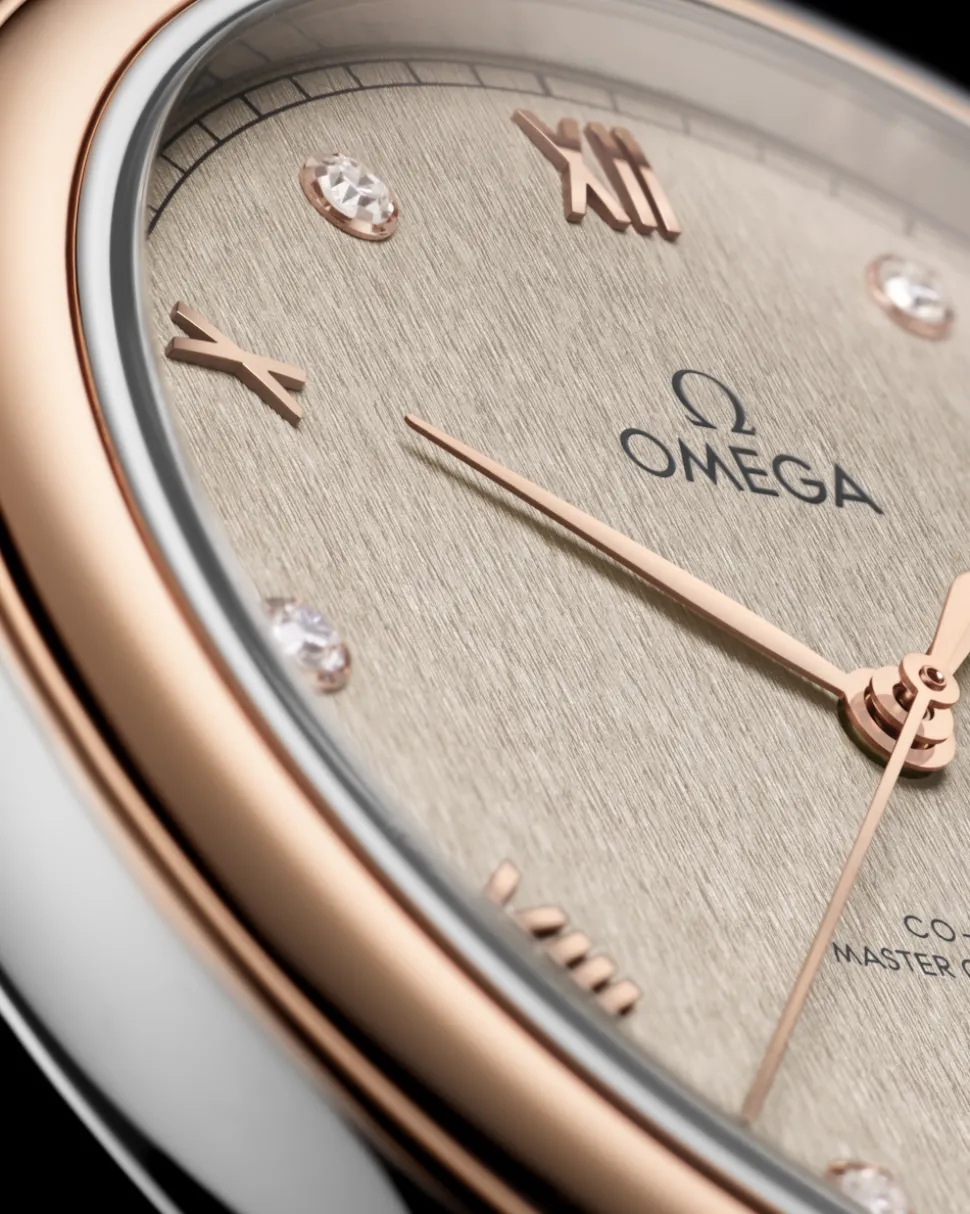 40 mm, acciaio‑oro Sedna™ su cinturino di pelle