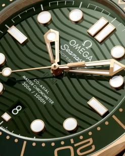 42 mm, oro Moonshine™ su cinturino in caucciù