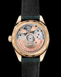 34 mm, oro Moonshine™ su cinturino di pelle