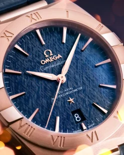 39 mm, oro Sedna™ su cinturino di pelle