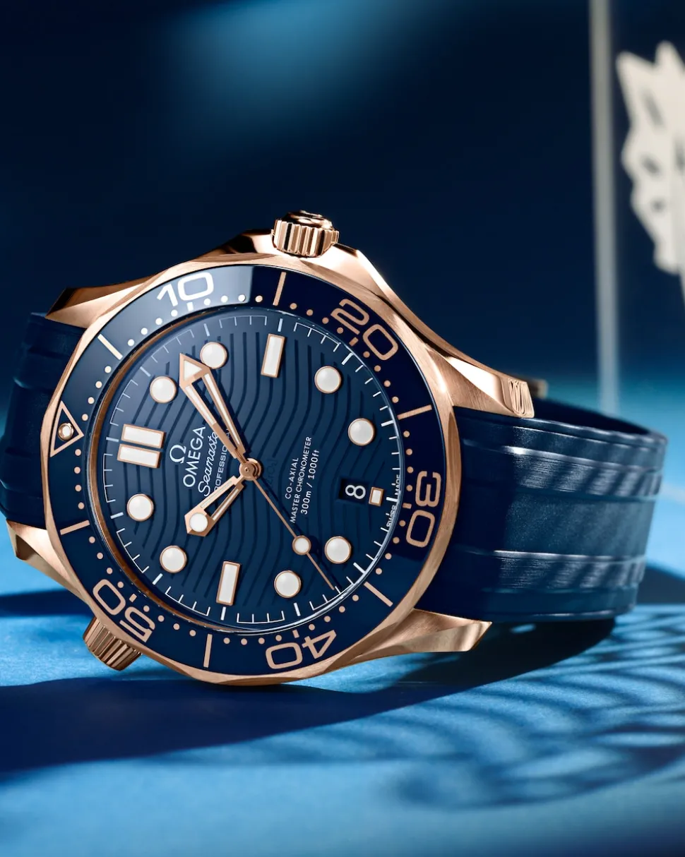 42 mm, oro Sedna™ su cinturino in caucciù